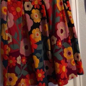 Madison full skirt  hidden side pockets.